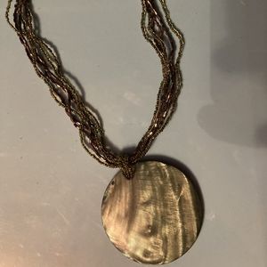 Mother of pearl necklace with brown and green tones